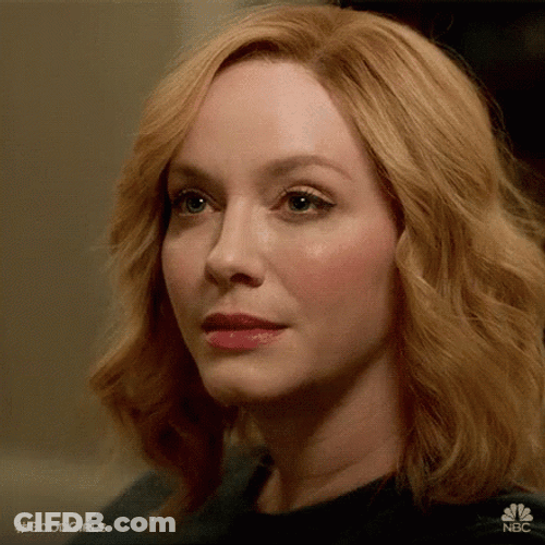 Christina Hendricks Is Sadly Shaking Her Head GIF