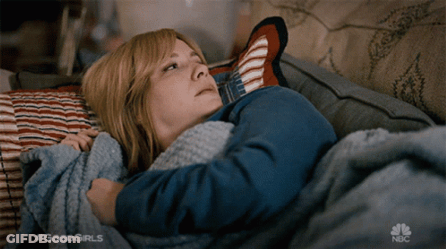Christina Hendricks Lying In A Sofa GIF