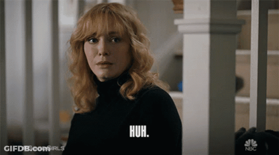 Christina Hendricks Saying Huh While Blinking GIF