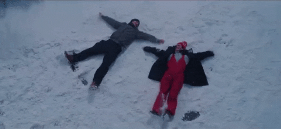 Christmas Couple Snow Angel GIF
