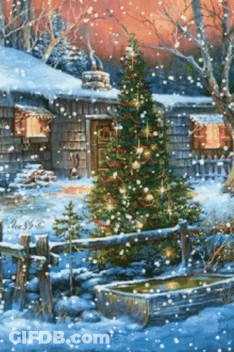 Christmas Tree In Front Of Cabin In Snow GIF