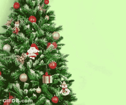 Christmas Tree With Santa Decorations And Red Balls GIF