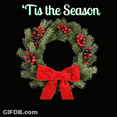 Christmas Wreath With Red Berries And Bow On Black Background Saying Tis The Season GIF