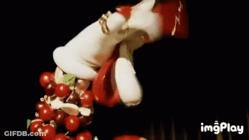Christmas Wreath With Red Berries And White Hat GIF