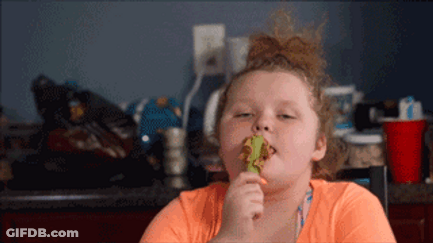 Chubby Girl Licks Peanut Butter On Spoon GIF