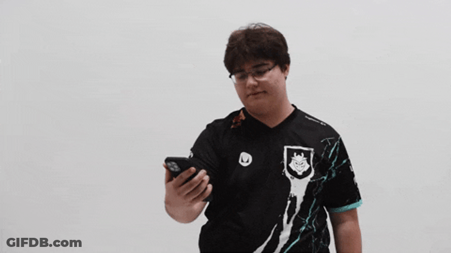 Chubby Guy Looks At Phone But Not Again GIF