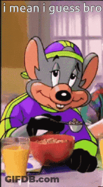 Chuck E Cheese Sitting At Table With Cereal And Orange Juice GIF