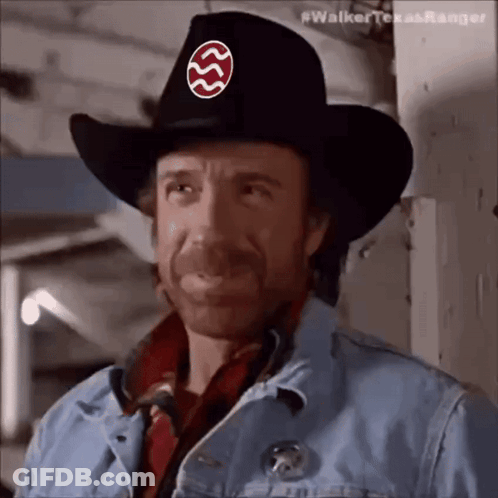 Chuck Norris In Cowboy Hat With Walker Texas Ranger Badge GIF