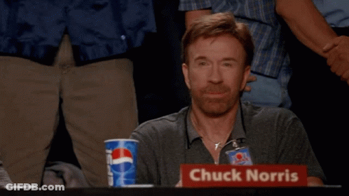 Chuck Norris Is Giving A Thumbs Up In Front Of A Pepsi Cup GIF