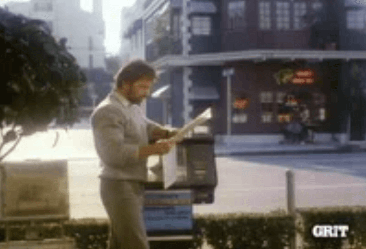 Chuck Norris Thumbs Up Reading Newspaper Punch GIF