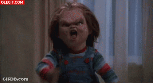 Chucky Doll Mouth Open Arms Outstretched GIF