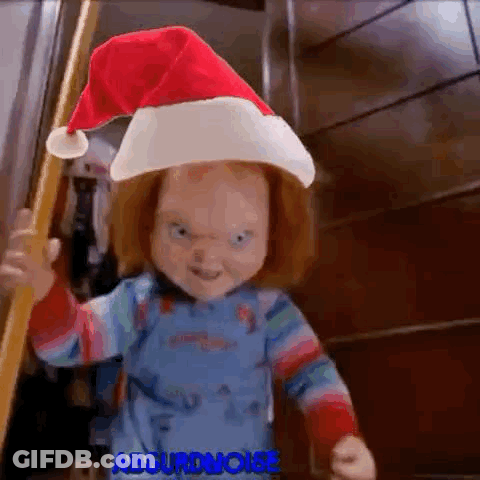 Chucky Doll With Santa Hat Holding Pole GIF