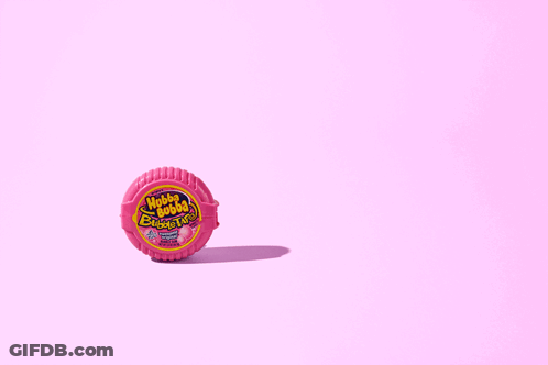 Chupa Chups Gum Roll On Pink Surface GIF