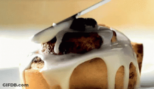 Cinnamon Roll With White Frosting GIF
