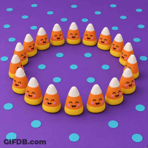Circle Of Candy Corn On Purple Surface GIF
