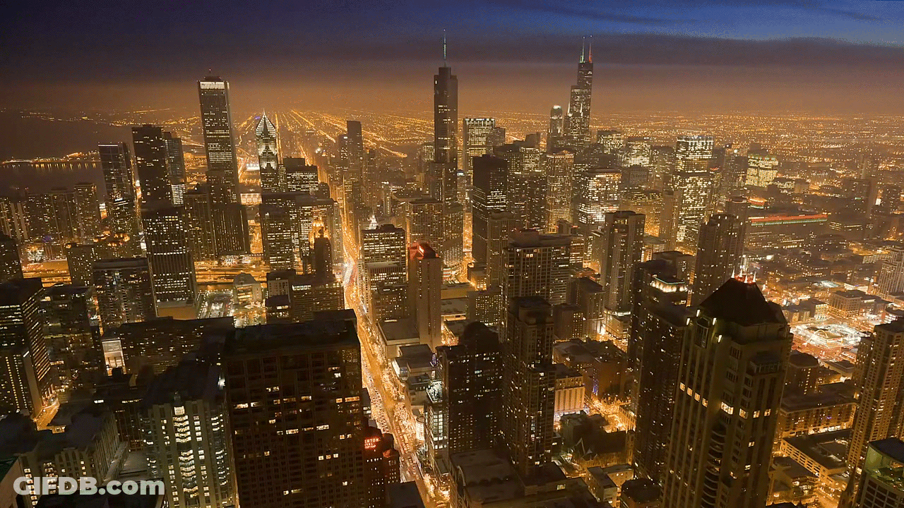 City At Night Lit Buildings GIF