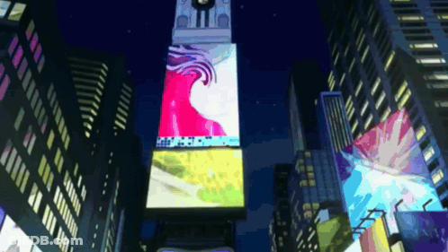 City At Night With Clock Tower And Times Square Billboard GIF