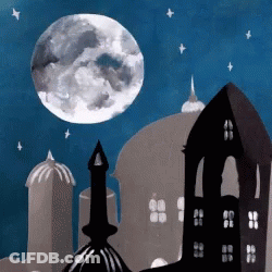City At Night With Full Moon And Stars GIF