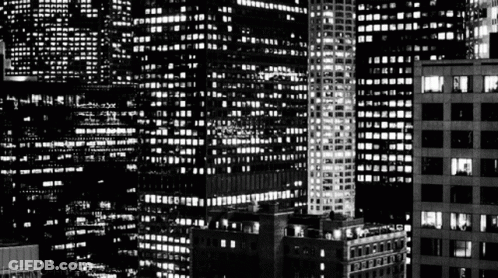 City At Night With Lit Buildings GIF