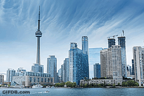 City Skyline With Very Tall Tower GIF