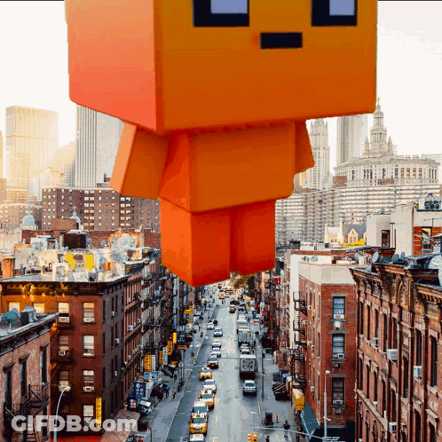City Street With Giant Orange Block GIF