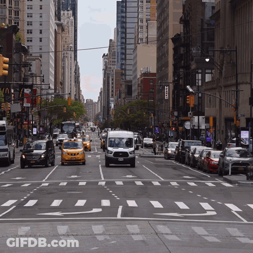 City Street With Taxi Sign GIF