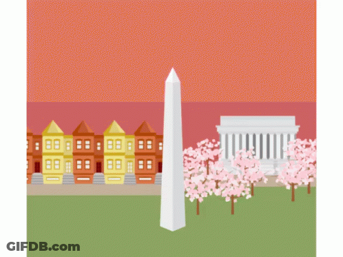 City Surrounded By Mountains And Trees GIF