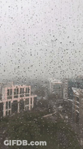 City View Through Rainy Window GIF