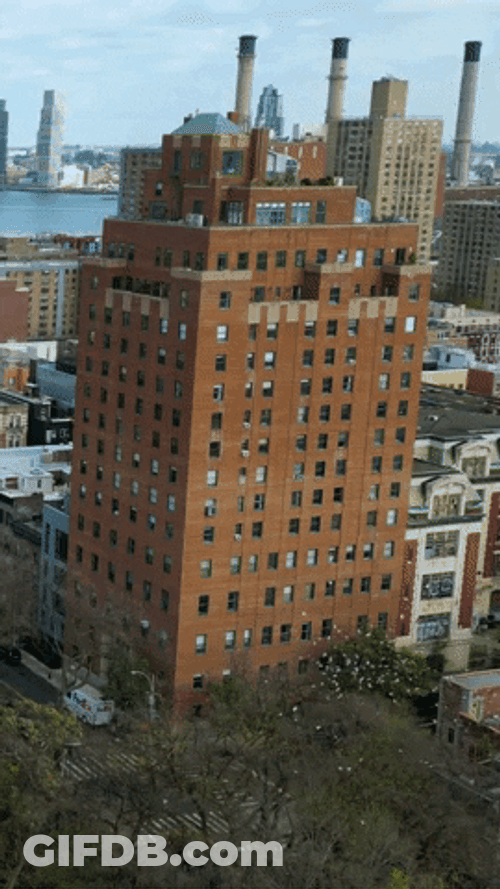 Cityscape Overlooking Lake Ahead GIF