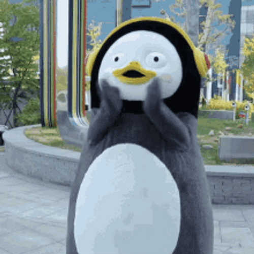 Clapping Penguin Mascot GIF