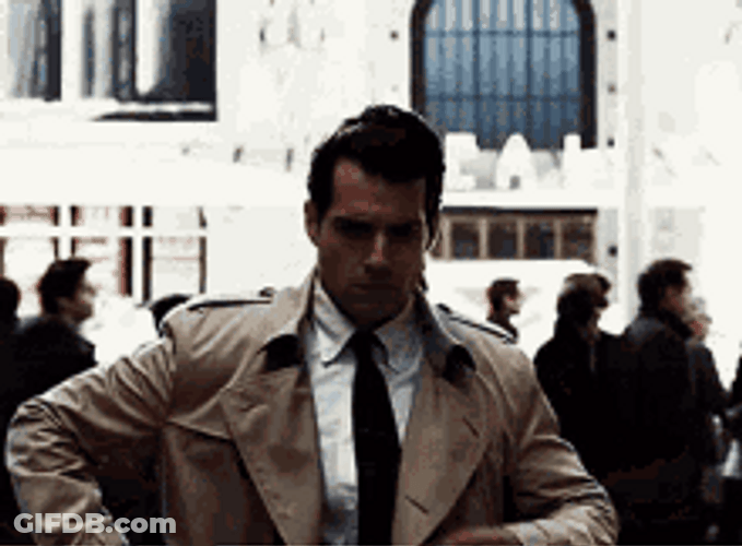 Clark Showing Superman Logo GIF