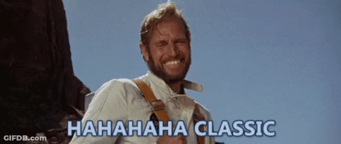 Classic Charlton Heston Laughing GIF