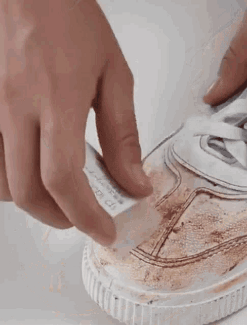 Cleaning Shoes Using Eraser GIF