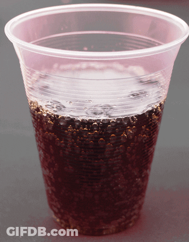 Clear Plastic Cup With Dark Liquid GIF