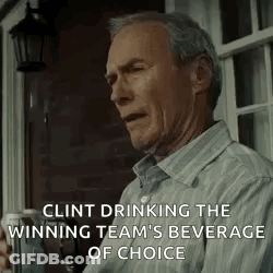 Clint Eastwood Is Drinking The Winning Team 'S Beverage Of Choice While Sitting On A Porch . GIF