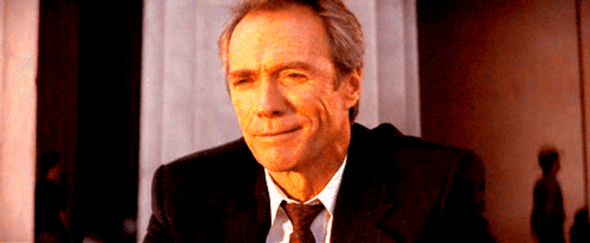 Clint Eastwood Waving Bye GIF