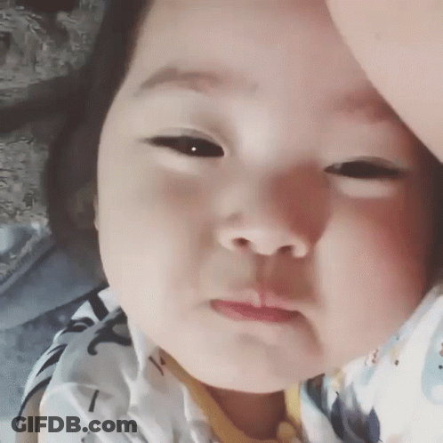 Close Up Baby Making A Face GIF