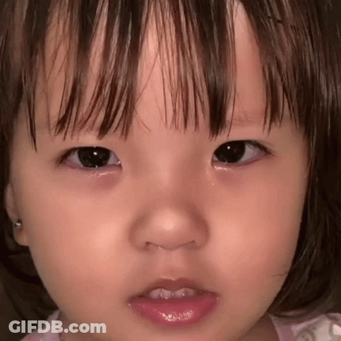 Close Up Baby With Tear Running Down Eye GIF