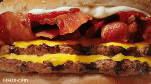 Close Up Bacon Cheeseburger With Ketchup And Mayonnaise GIF