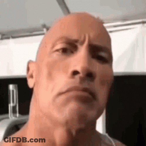 Close Up Bald Man Serious Expression GIF