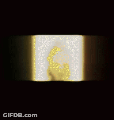 Close Up Cartoon Face Surrounded By Fire GIF