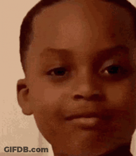 Close Up Child Serious Face GIF