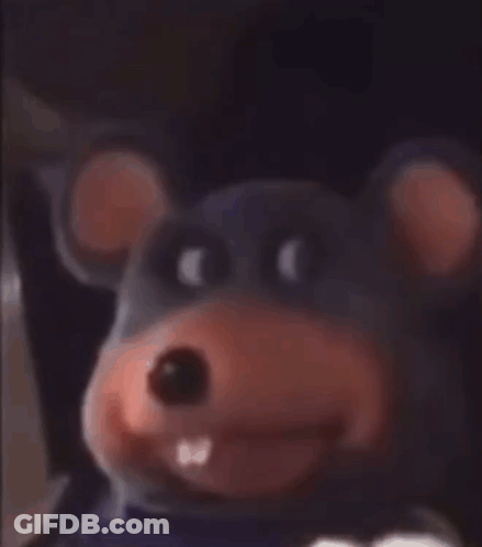 Close Up Chuck E. Cheese Stuffed Mouse With Big Teeth GIF