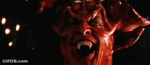 Close Up Demon Face With Mouth Open GIF