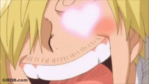 Close Up Face Blowing Heart GIF