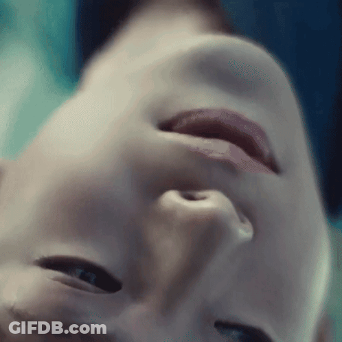 Close Up Face Blue Background GIF