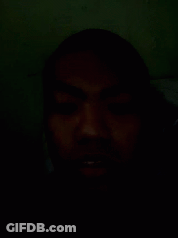 Close Up Face In Dark With Eyes Closed GIF