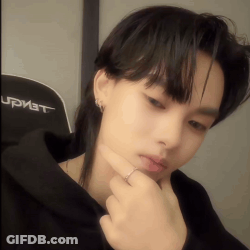 Close-Up Face In Front Of Upmet Chair GIF