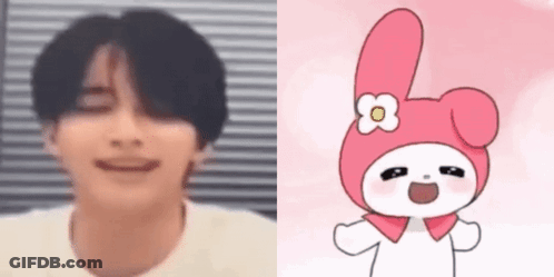 Close Up Face Next To Bunny With Flower GIF