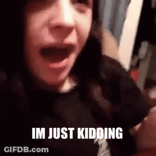Close Up Face Saying Im Just Kidding GIF